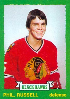 1973 O-Pee-Chee Phil Russell #243 Hockey Card