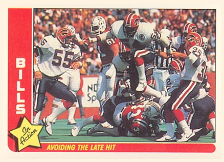 1985 Fleer Team Action Bills-Avoiding the late hit #6 Football Card