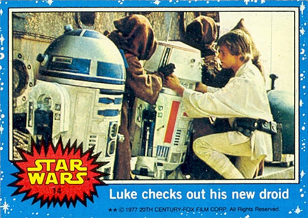 1977 Star Wars Luke checks out his new droid #14 Non-Sports Card