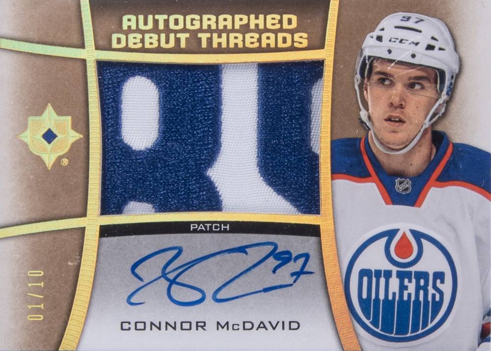 2015 Upper Deck Ultimate Collection Debut Threads Autograph Connor McDavid #ADTCM Hockey Card