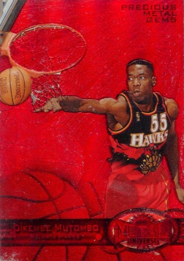 1997 Metal Universe Precious Metal Gems Dikembe Mutombo #106 Basketball Card